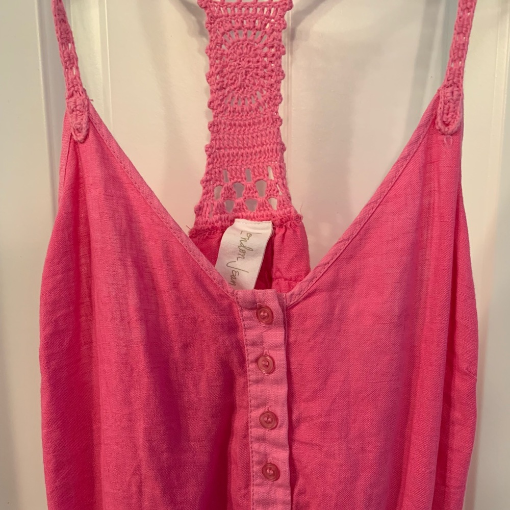 Pink romper.